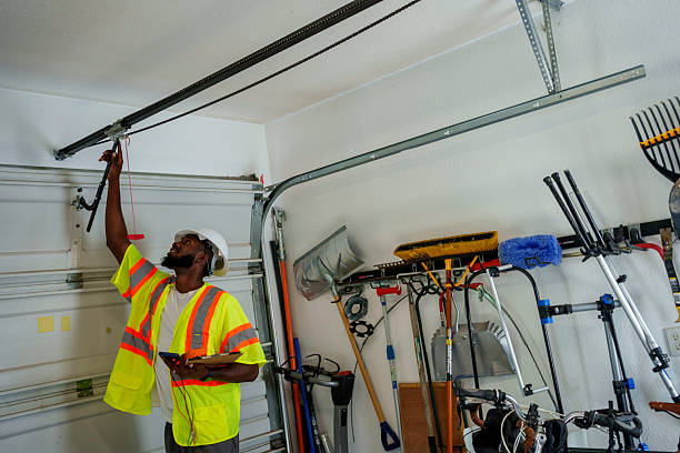 Professional Garage Door Panel Replacement technician working in Washington County County, OK